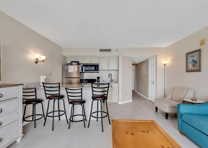 Hosteeva Beach Front 1BR Ocean Forest Plaza Condo w Views